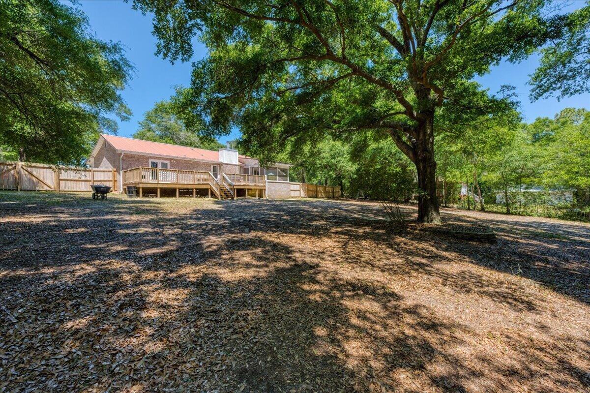 210 Shell Drive Crestview, FL 32536 - Photo 53 of 67 a view of a house with a yard