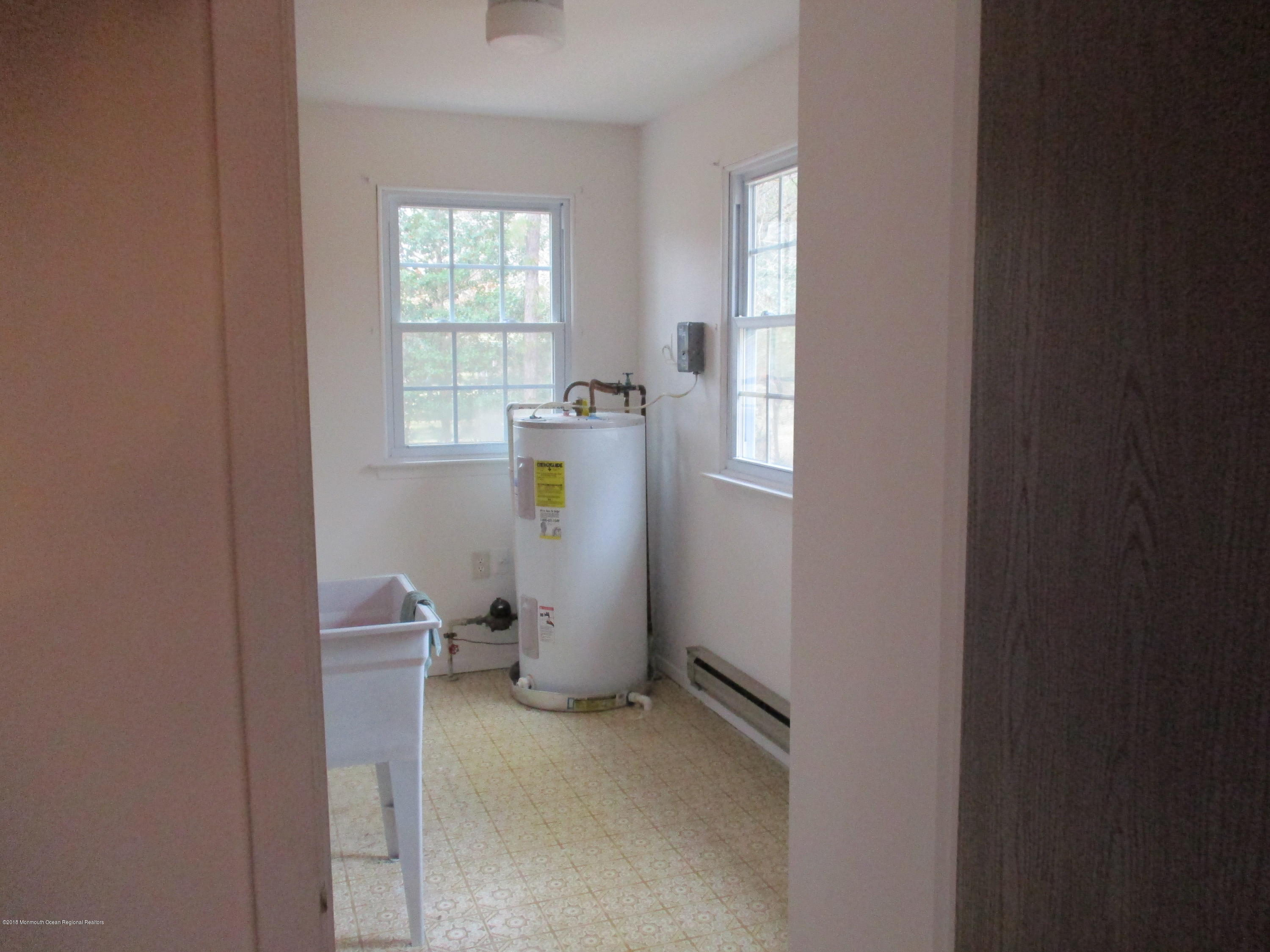 85 Sunset Road, Unit 60 Whiting, NJ 08759 - Photo 13 of 18 a view of a room with a window