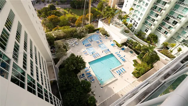 a view of staircase with wooden floor and stairs
