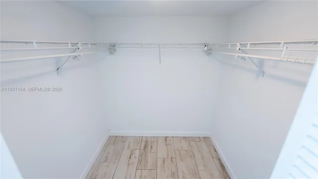 a view of a room with racks on the wall