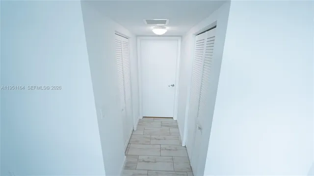 a kitchen with sink cabinets and stove