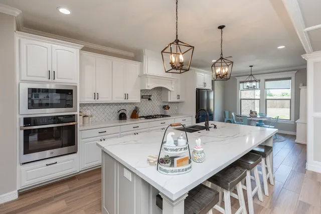 a view of kitchen and sink