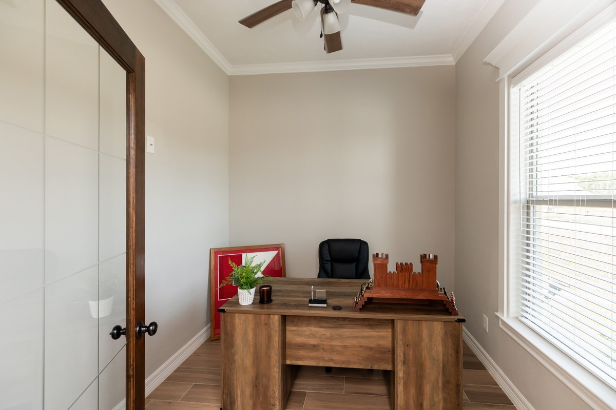 1880 Brenner Boulevard Lumberton, TX 77657 - Photo 4 of 32 a view of a workspace with furniture and window