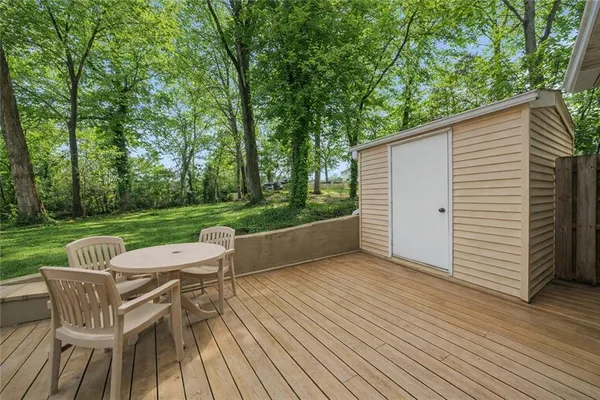 a view of a patio with a yard