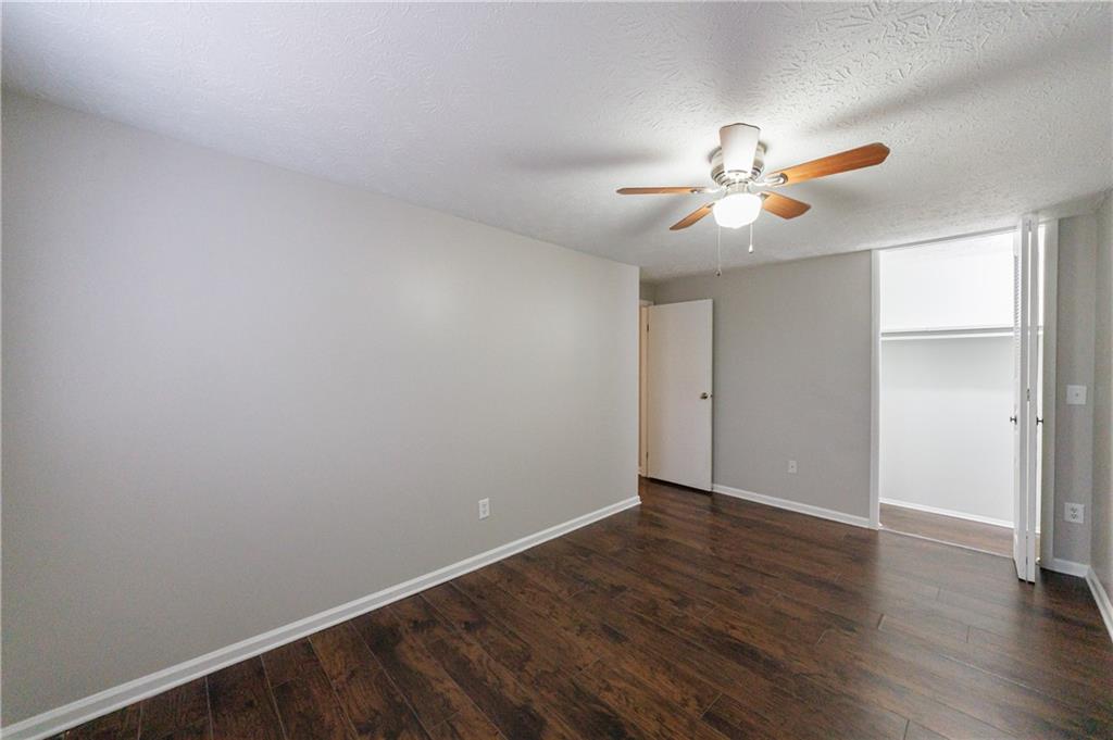 1960 Hamilton Place Southeast Marietta, GA 30067 - Photo 21 of 22 wooden floor in an empty room with a window