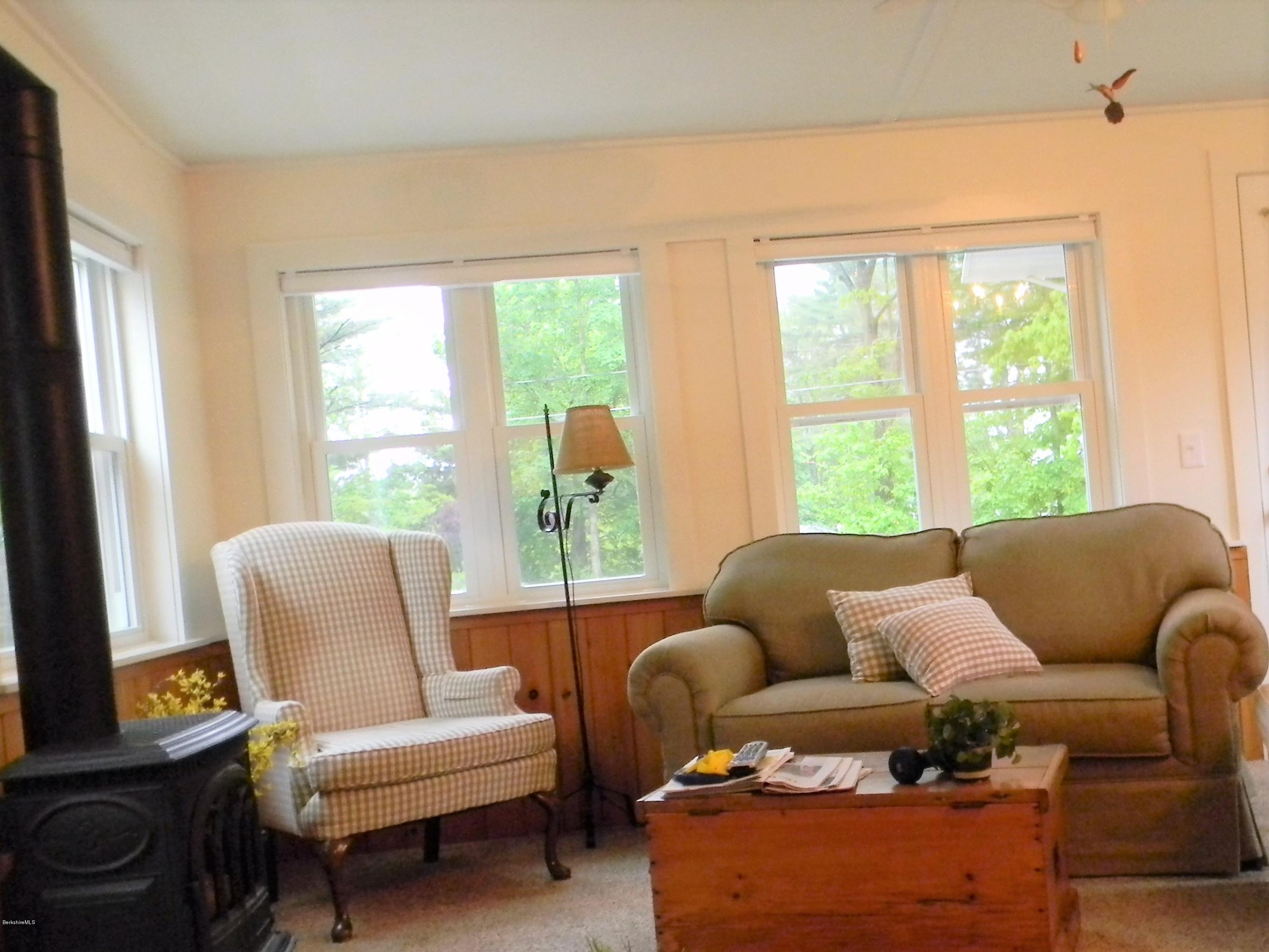 9 Balance Rock Road Lanesborough, MA 01237 - Photo 13 of 20 a living room with furniture and a large window