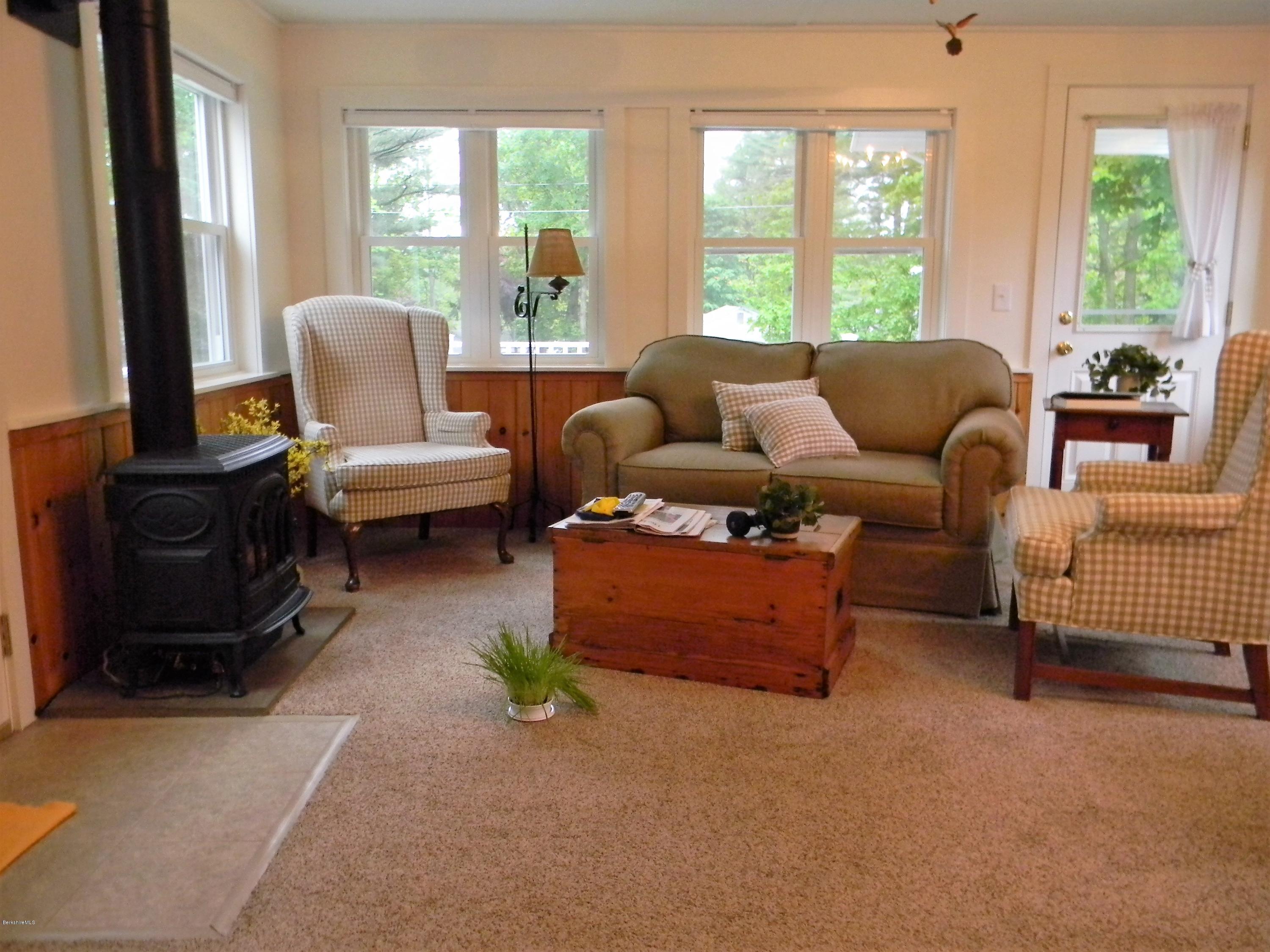 9 Balance Rock Road Lanesborough, MA 01237 - Photo 14 of 20 a living room with furniture and a flat screen tv