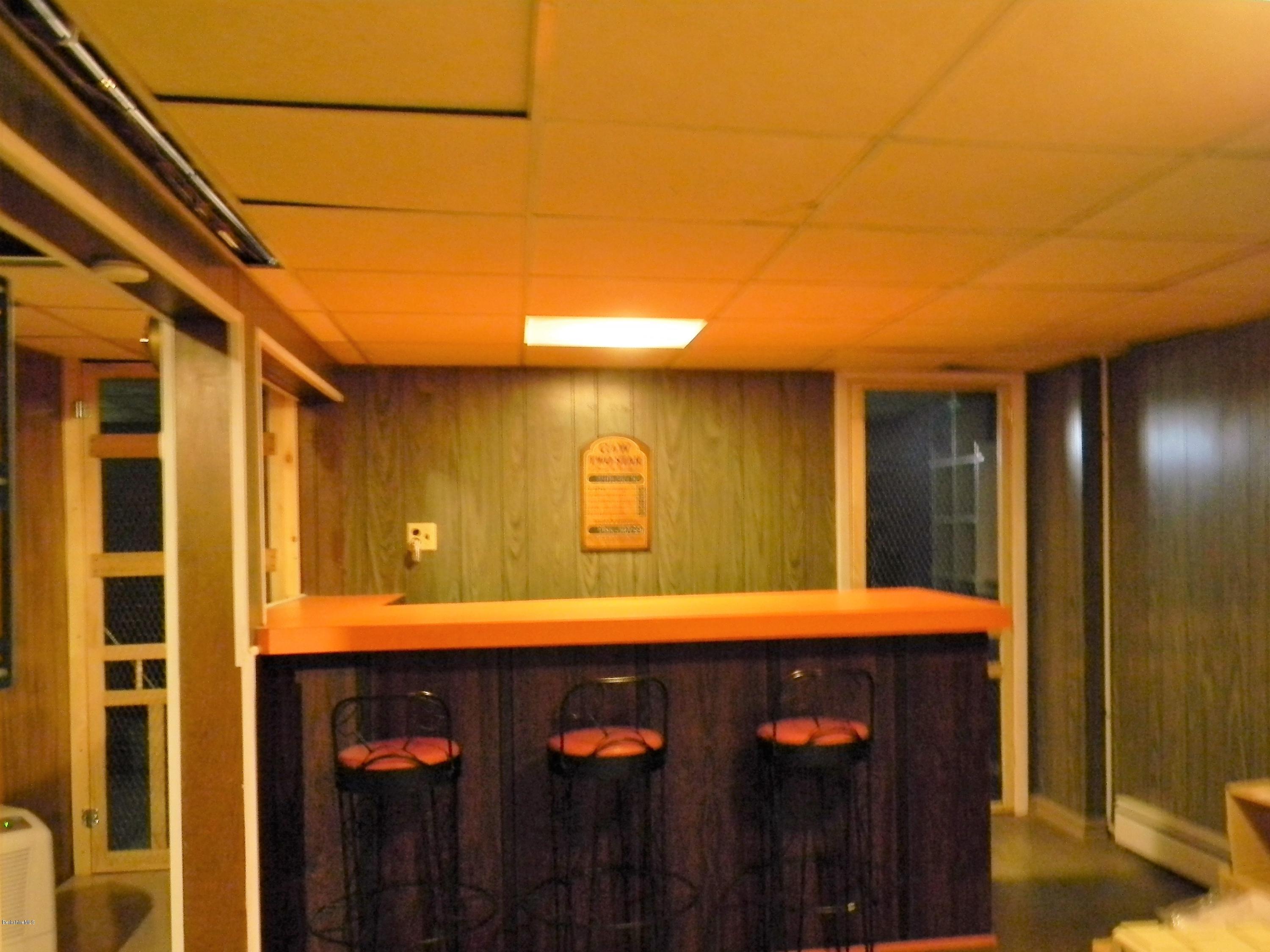 9 Balance Rock Road Lanesborough, MA 01237 - Photo 16 of 20 a bathroom with a sink and a mirror