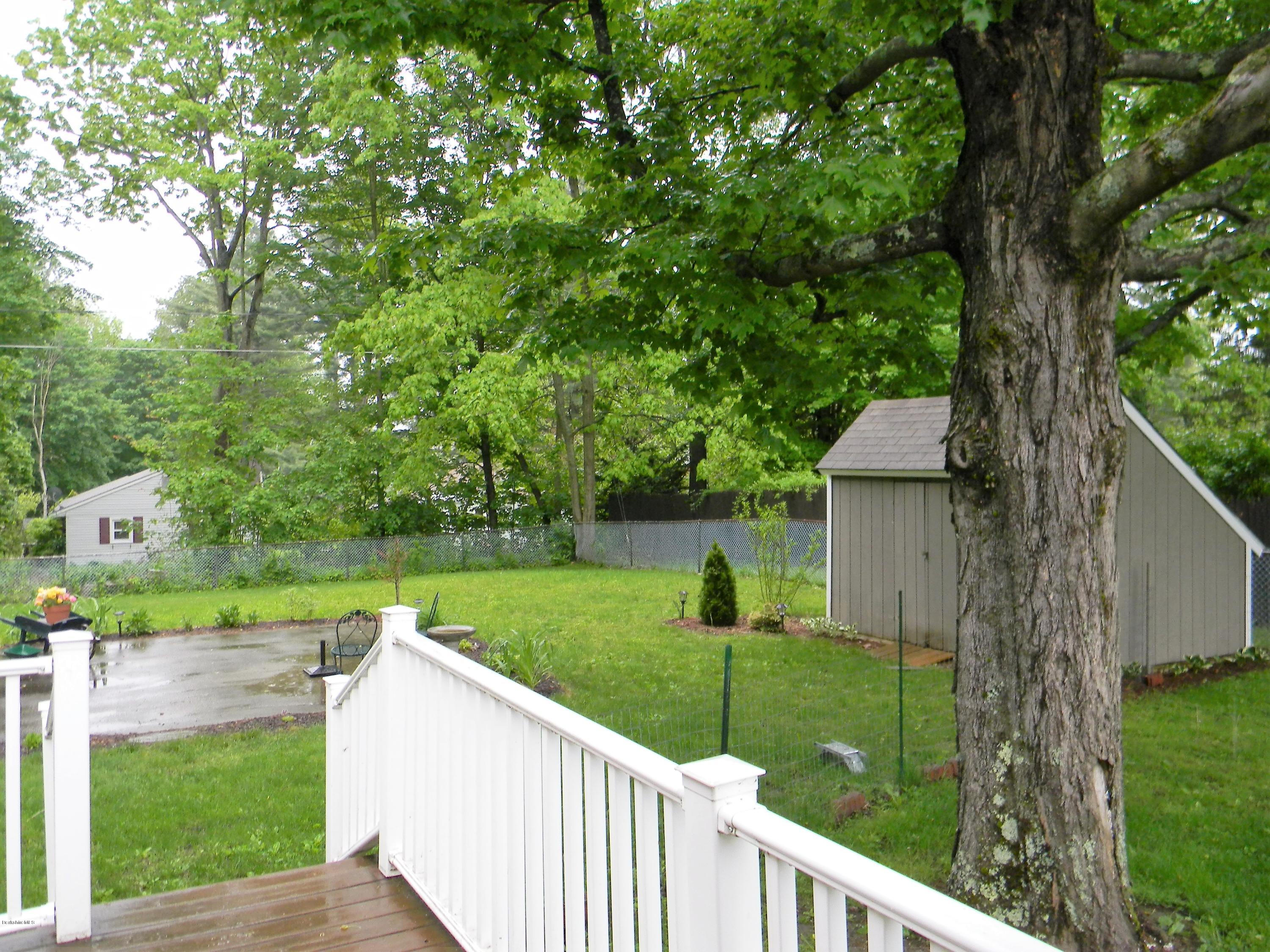 9 Balance Rock Road Lanesborough, MA 01237 - Photo 17 of 20 a view of a house with a yard and a large tree