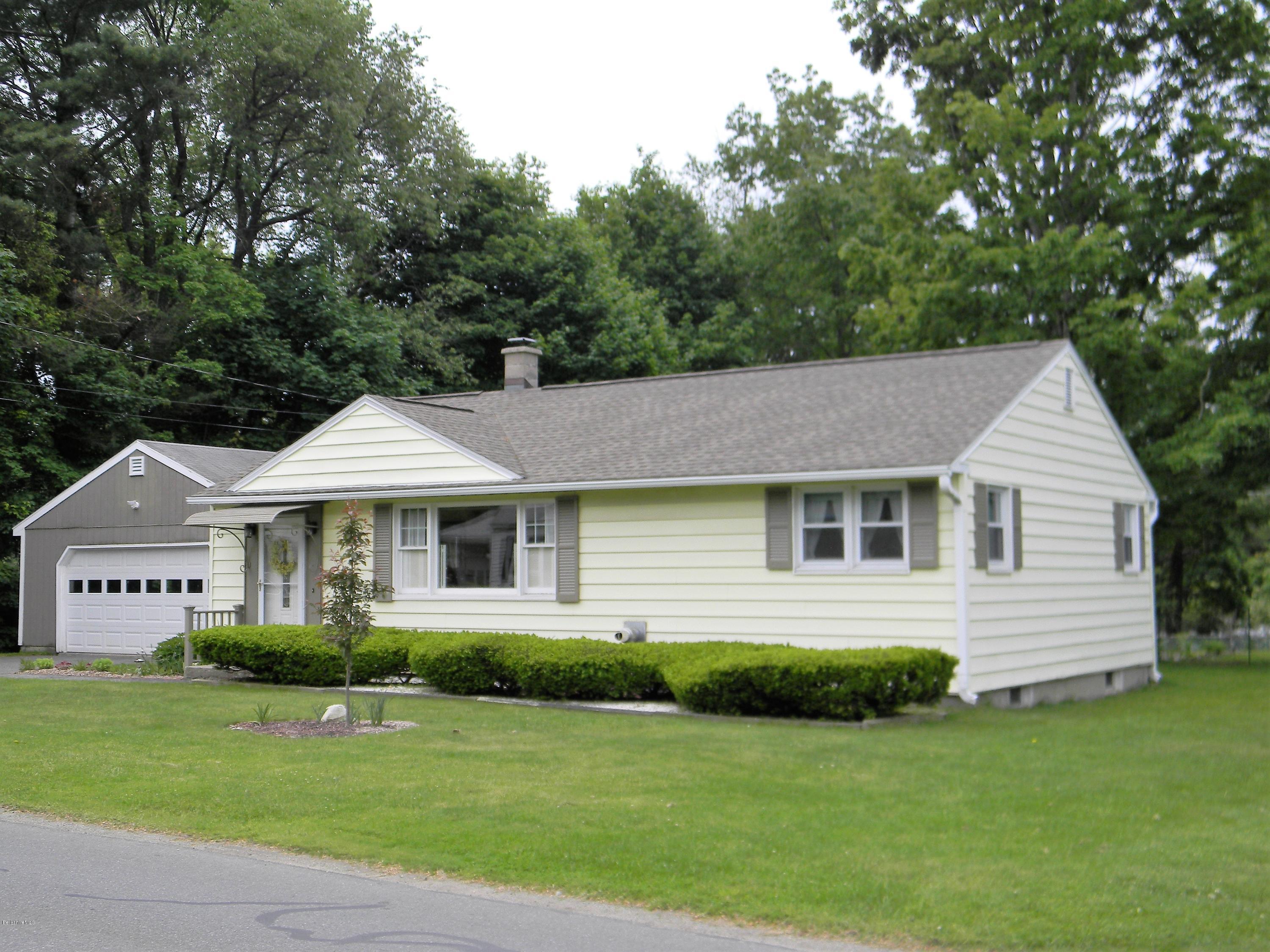 9 Balance Rock Road Lanesborough, MA 01237 - Photo 3 of 20 a front view of a house with a garden