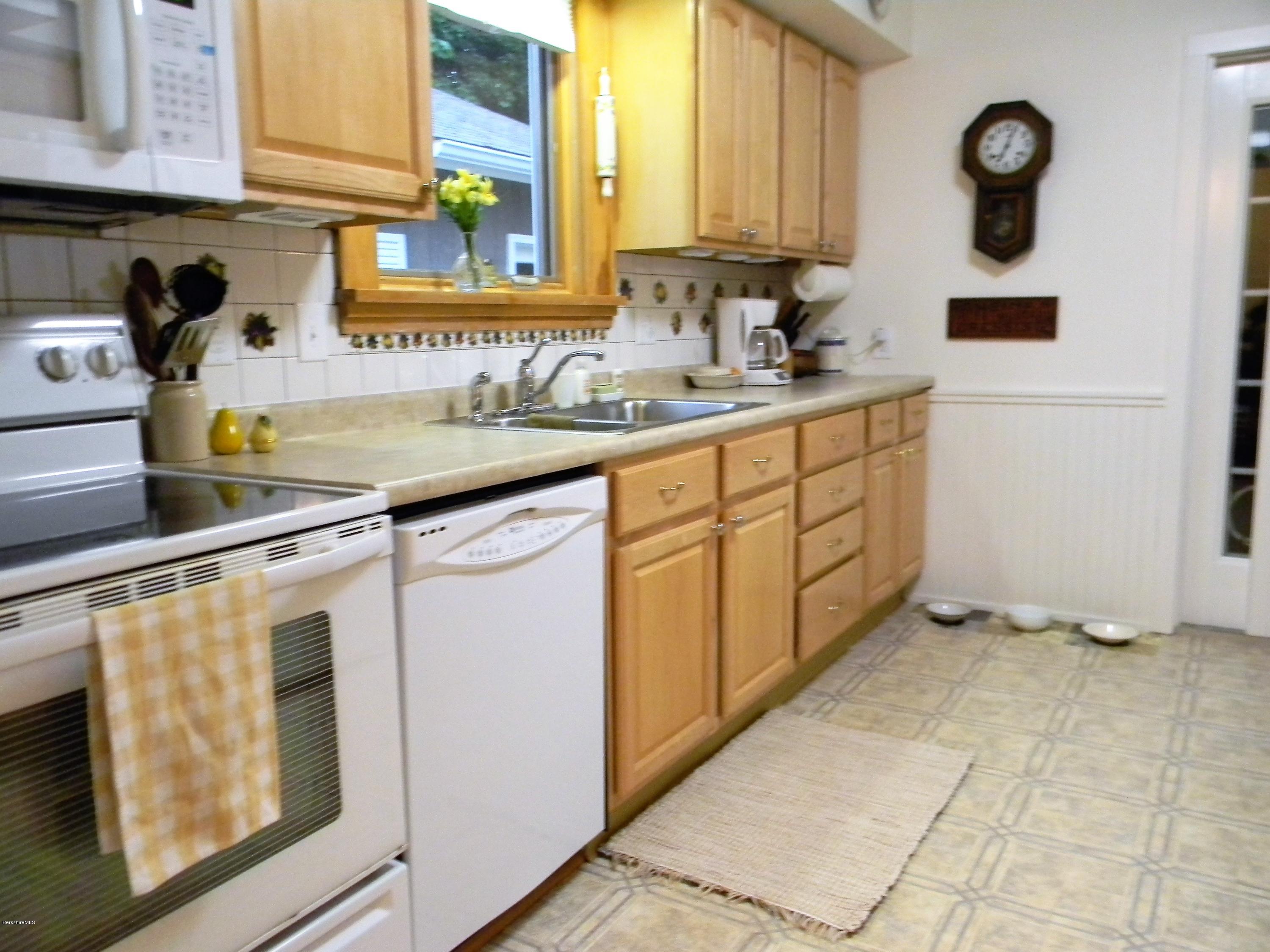 9 Balance Rock Road Lanesborough, MA 01237 - Photo 5 of 20 a kitchen with a sink cabinets and window