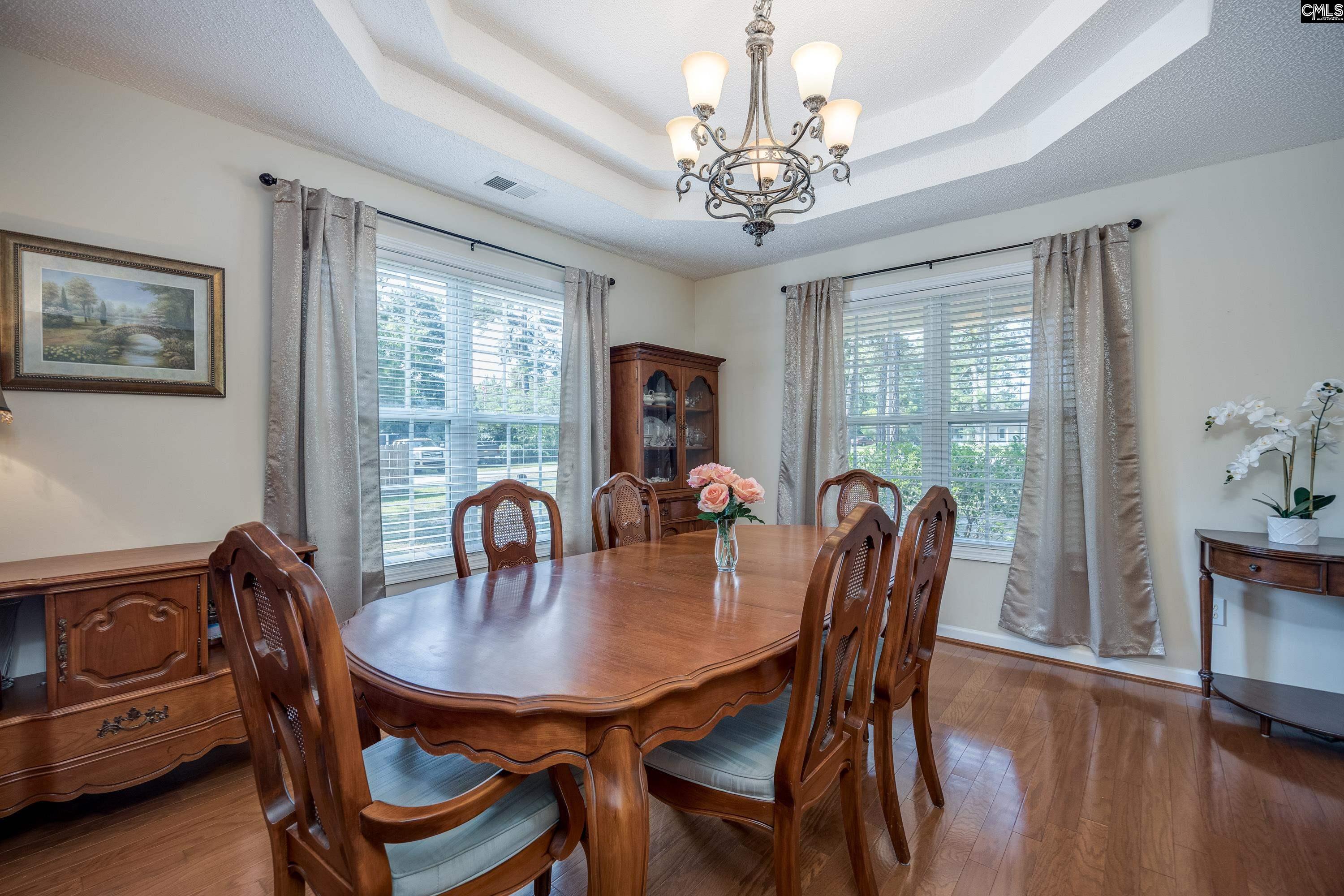 2032 Ridgeway Road Lugoff, SC 29078 - Photo 8 of 57 a view of a dining room with furniture window and outside view