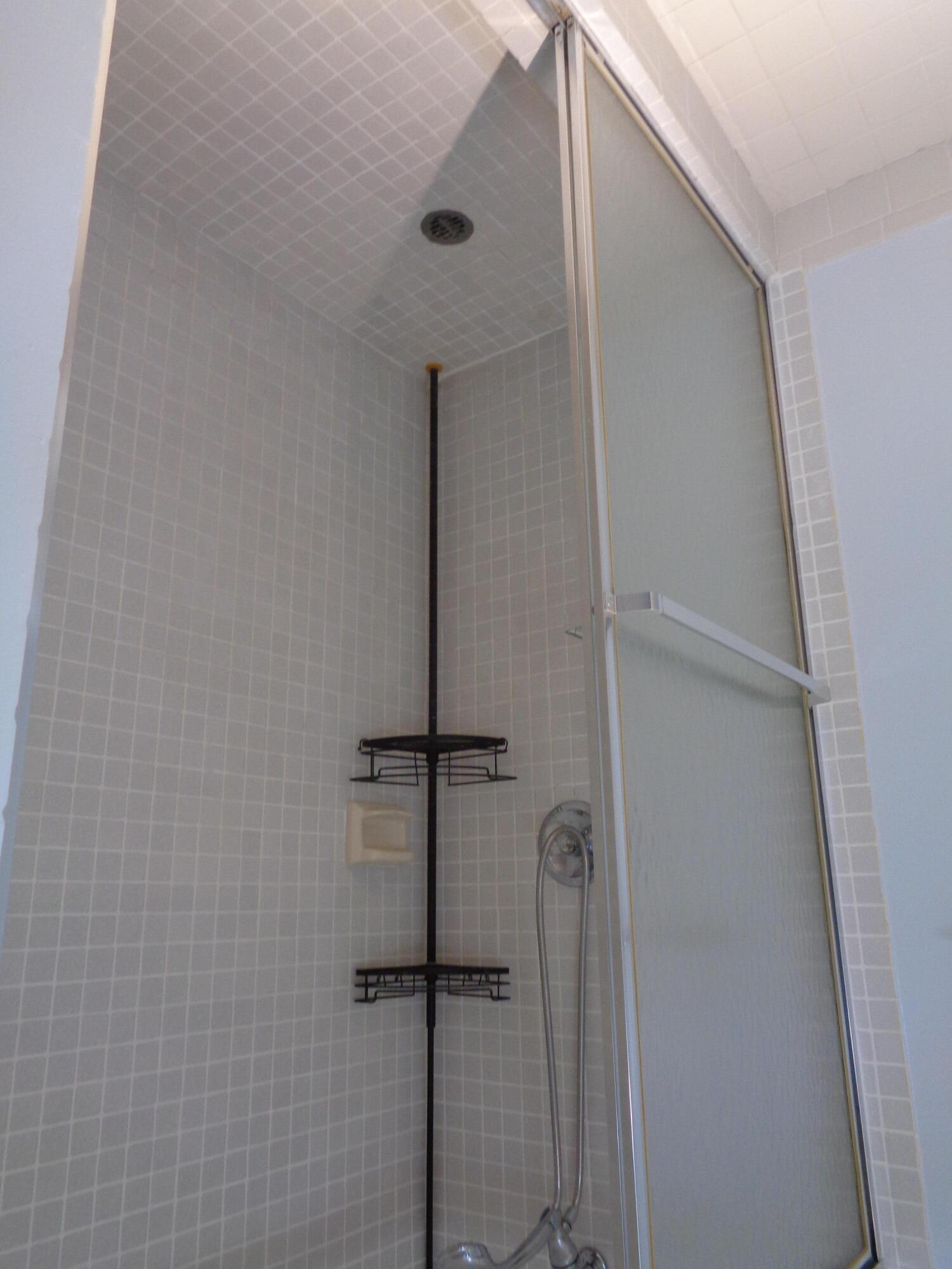 6328 Longboat Lane West, Unit 201 Boca Raton, FL 33433 - Photo 12 of 16 a bathroom with a shower
