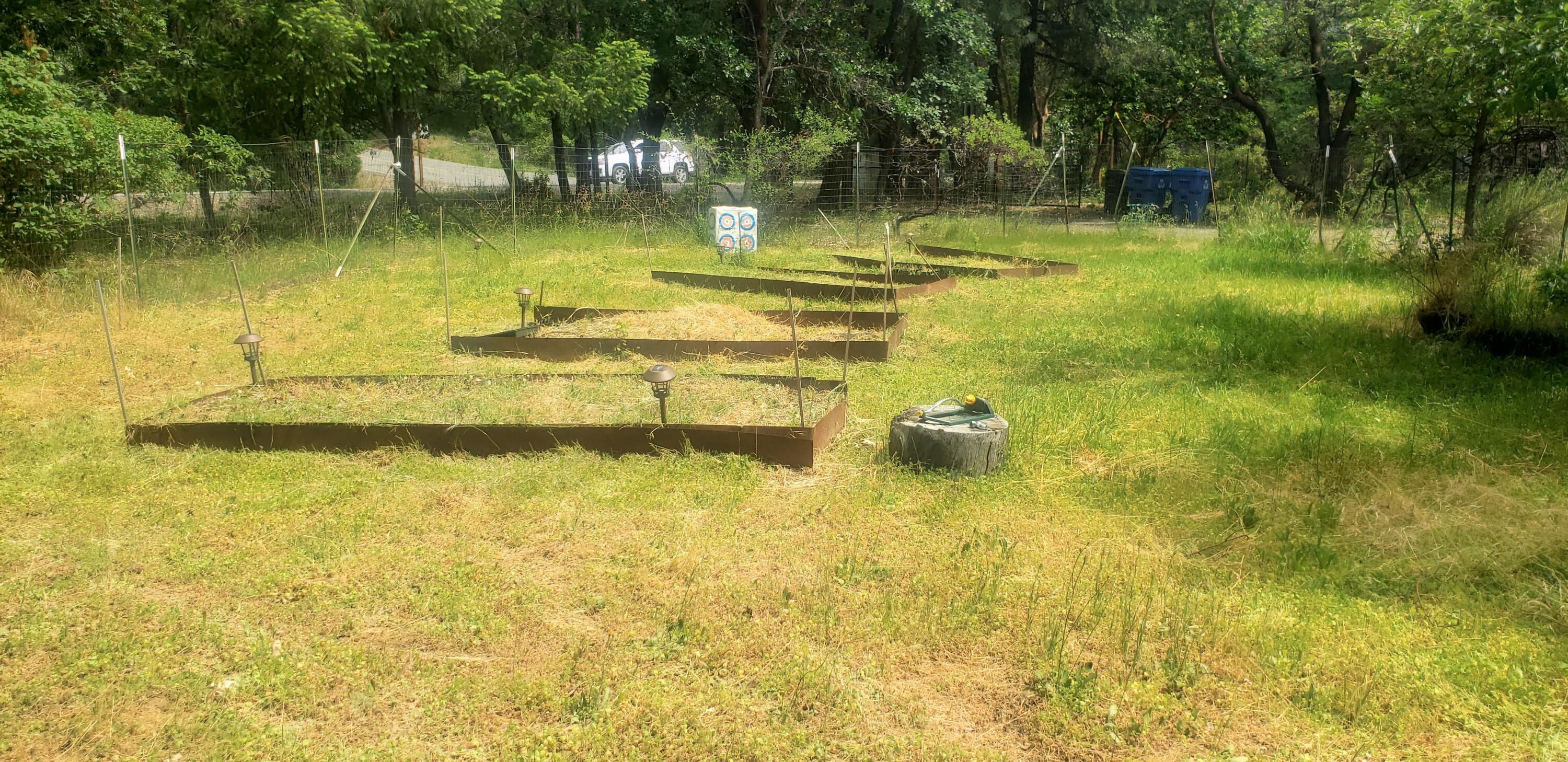 1424 Dick George Road Cave Junction, OR 97523 - Photo 21 of 22 Raised garden beds in front of home.