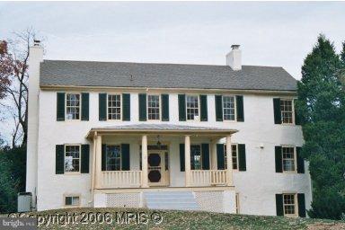 13726 New Windsor Road Union Bridge, MD 21791 - Photo 1 of 10 a front view of a house with a yard