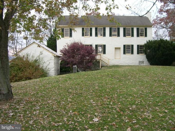 13726 New Windsor Road Union Bridge, MD 21791 - Photo 6 of 10 a front view of a house with a yard