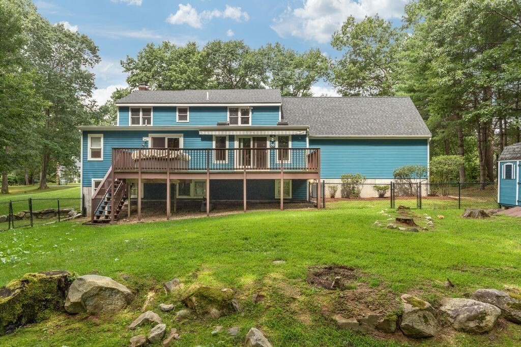 108 Blanchard Road Boxborough, MA 01719 - Photo 2 of 27 a view of a house with a yard and sitting area