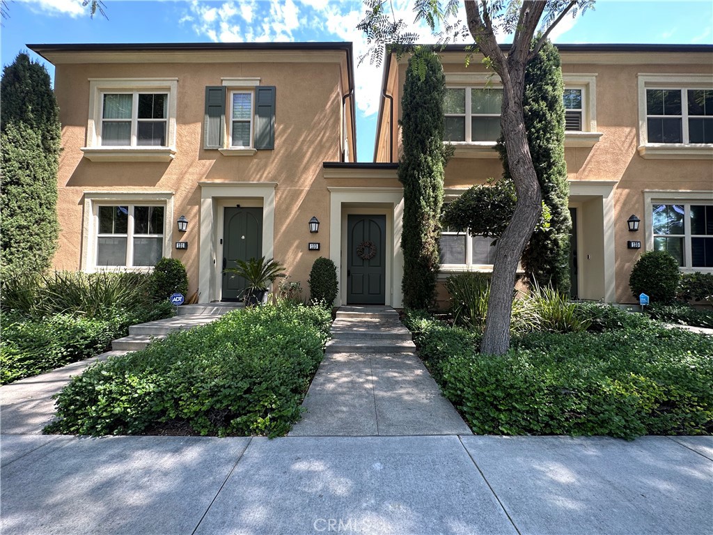 133 Lamplighter Irvine, CA 92620 - Photo 1 of 1 a front view of a house with garden