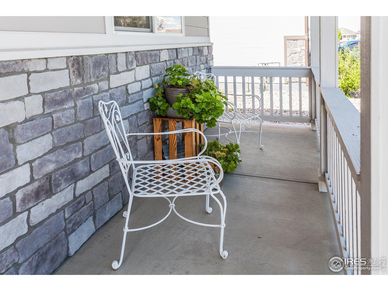 944 Maplebrook Drive Windsor, CO 80550 - Photo 2 of 32 a view of a balcony with furniture