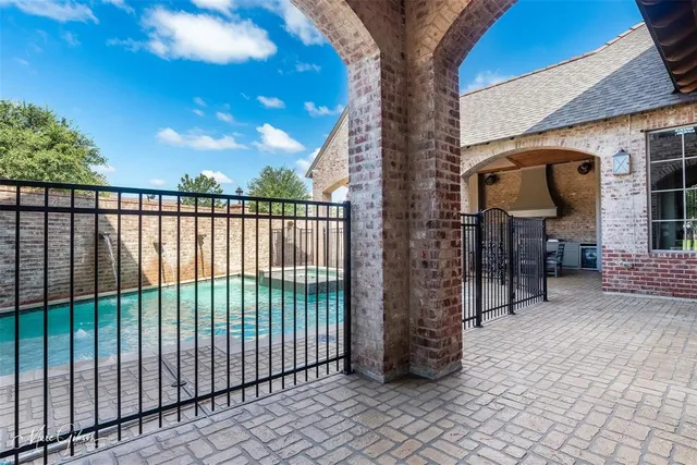 a view of a balcony with a tree