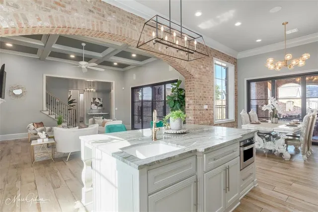 a view of a kitchen with granite countertop lots of counter top space