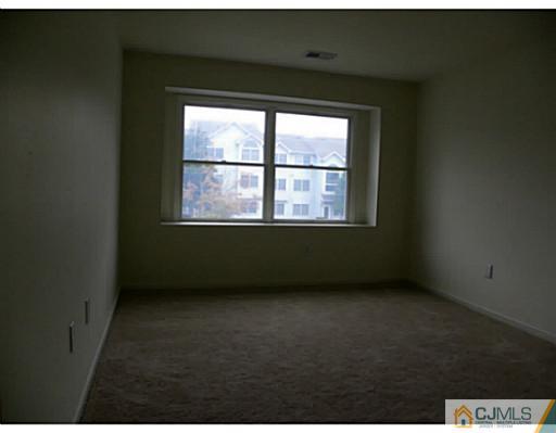 821 Edpas Road New Brunswick, NJ 08901 - Photo 11 of 12 an empty room with a window