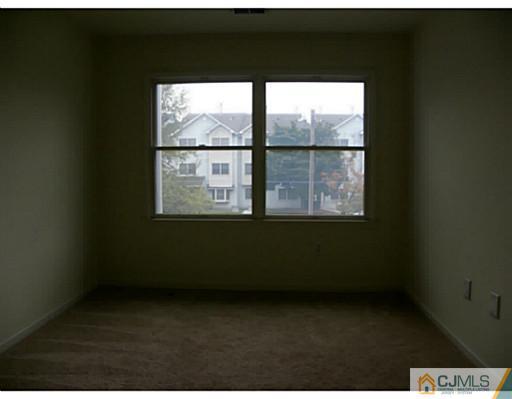 821 Edpas Road New Brunswick, NJ 08901 - Photo 12 of 12 a view of an empty room with a window