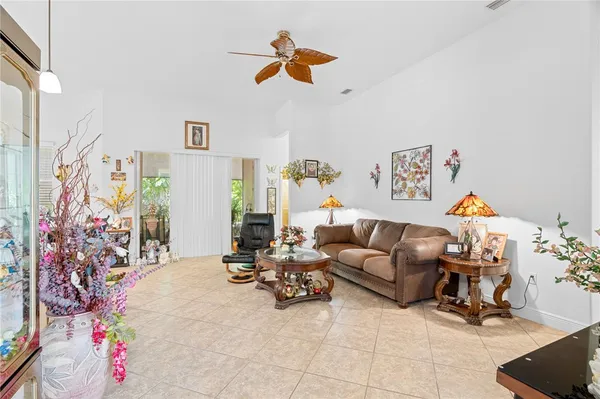 a view of walk in closet with clothes