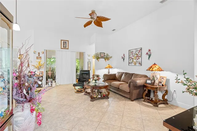 a view of walk in closet with clothes