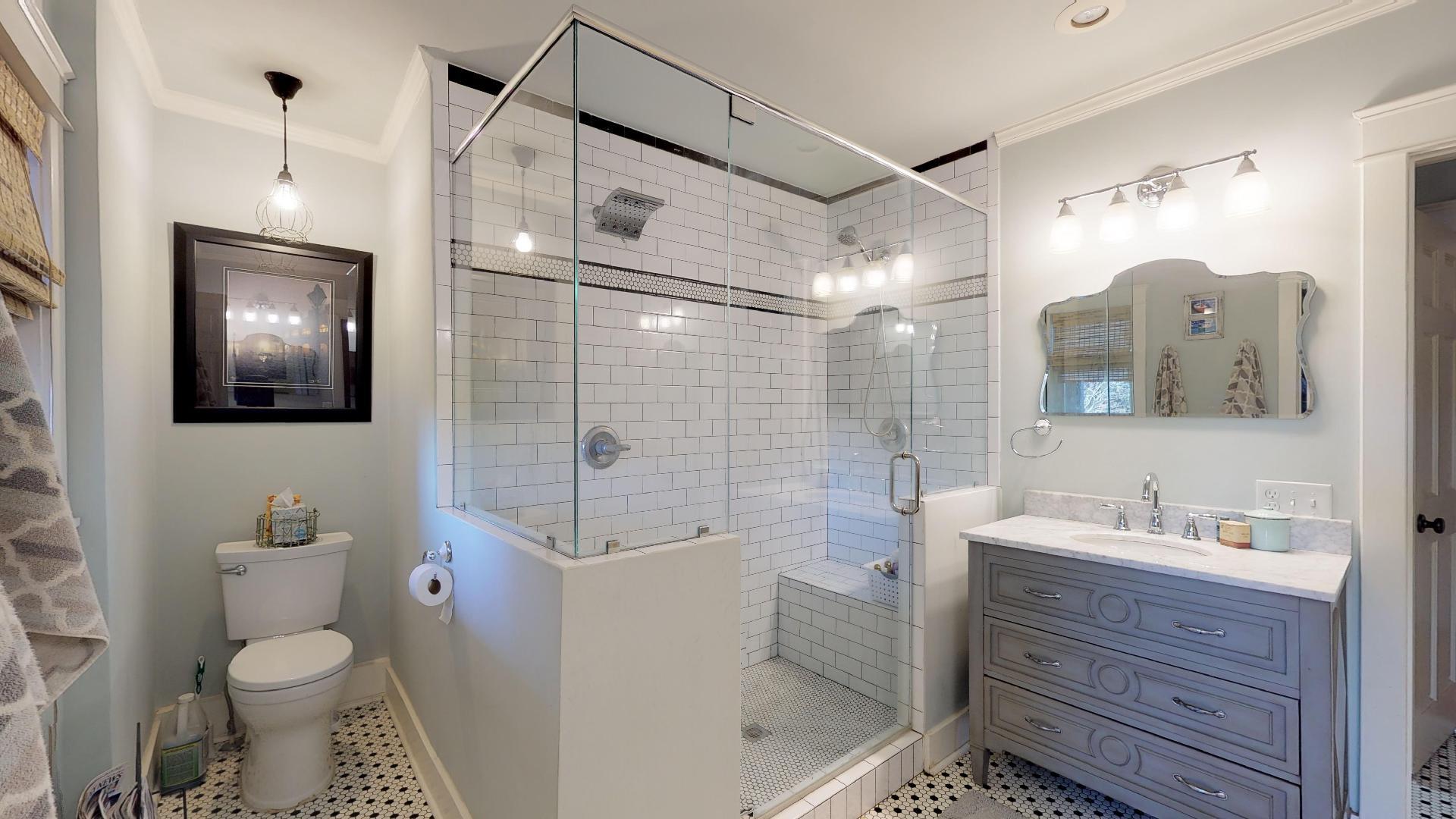 2281 Osburn Road Arrington, TN 37014 - Photo 12 of 29 a bathroom with a sink toilet a mirror and shower