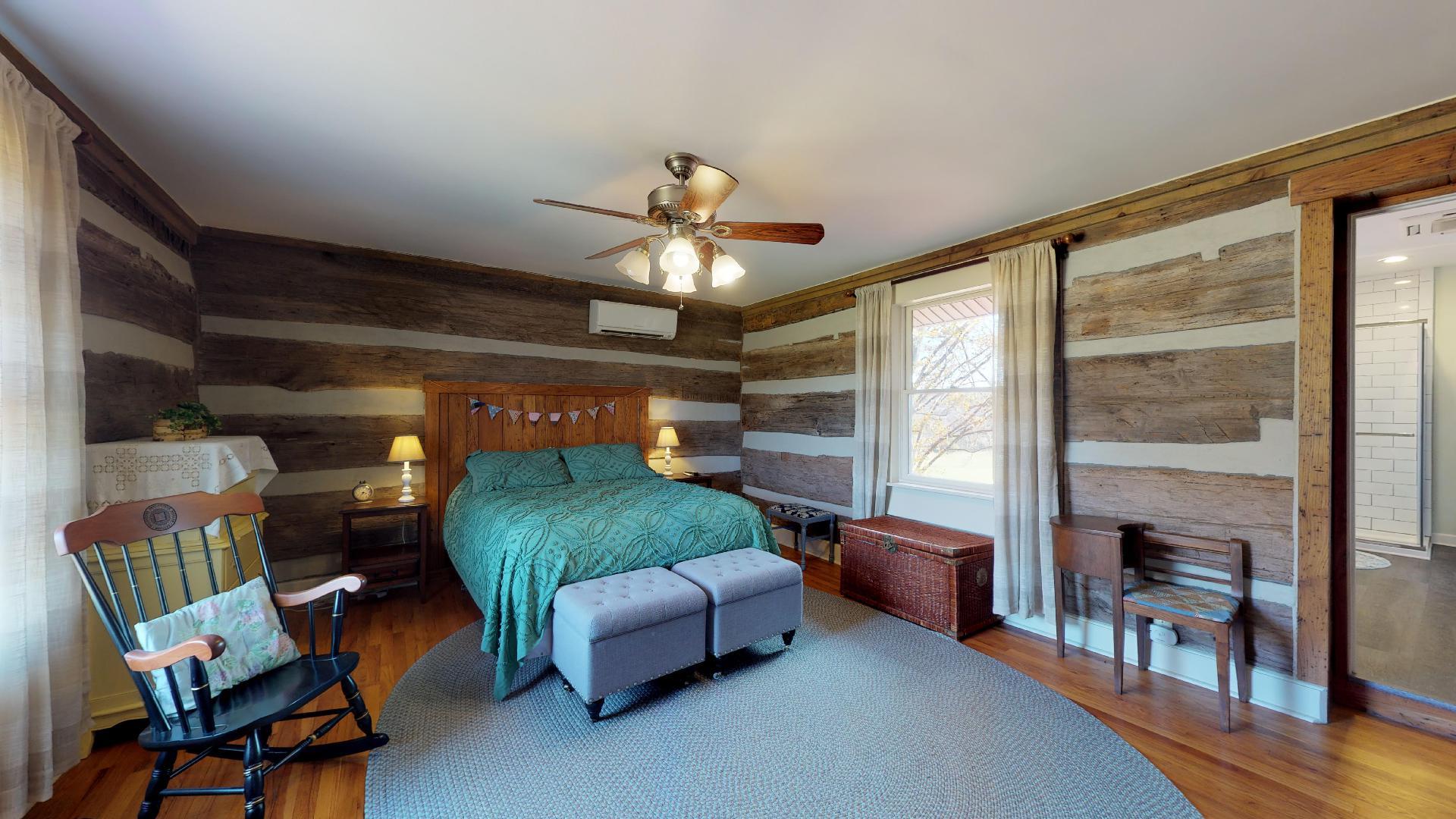 2281 Osburn Road Arrington, TN 37014 - Photo 14 of 29 a bedroom with furniture and a chandelier