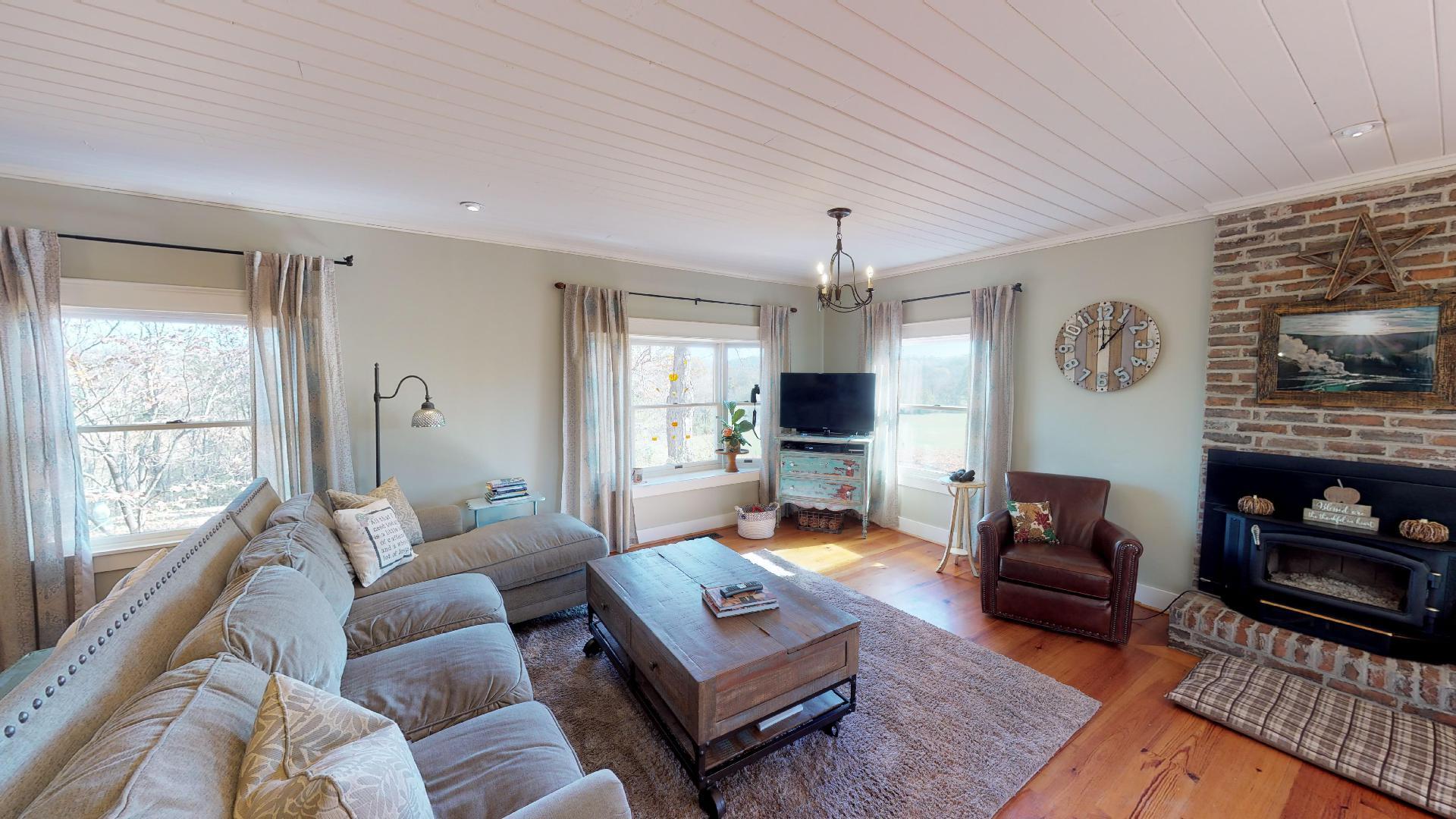 2281 Osburn Road Arrington, TN 37014 - Photo 24 of 29 a living room with furniture and a flat screen tv