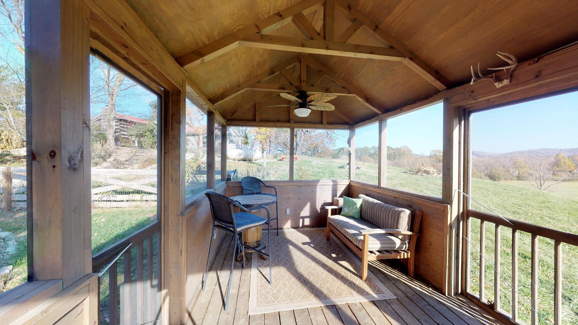 2281 Osburn Road Arrington, TN 37014 - Photo 29 of 29 a living room with furniture and a floor to ceiling window