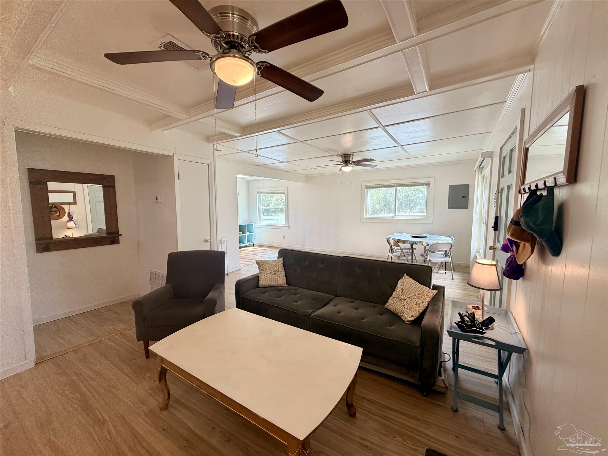 8816 Gibson Road Molino, FL 32577 - Photo 14 of 61 a living room with furniture and a flat screen tv