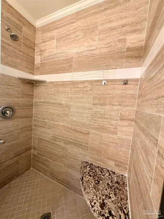 a bathroom with a toilet a sink and a mirror