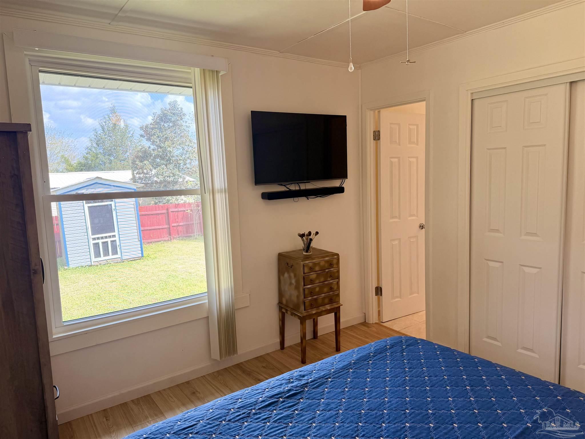8816 Gibson Road Molino, FL 32577 - Photo 35 of 61 a view of a livingroom with furniture and a window