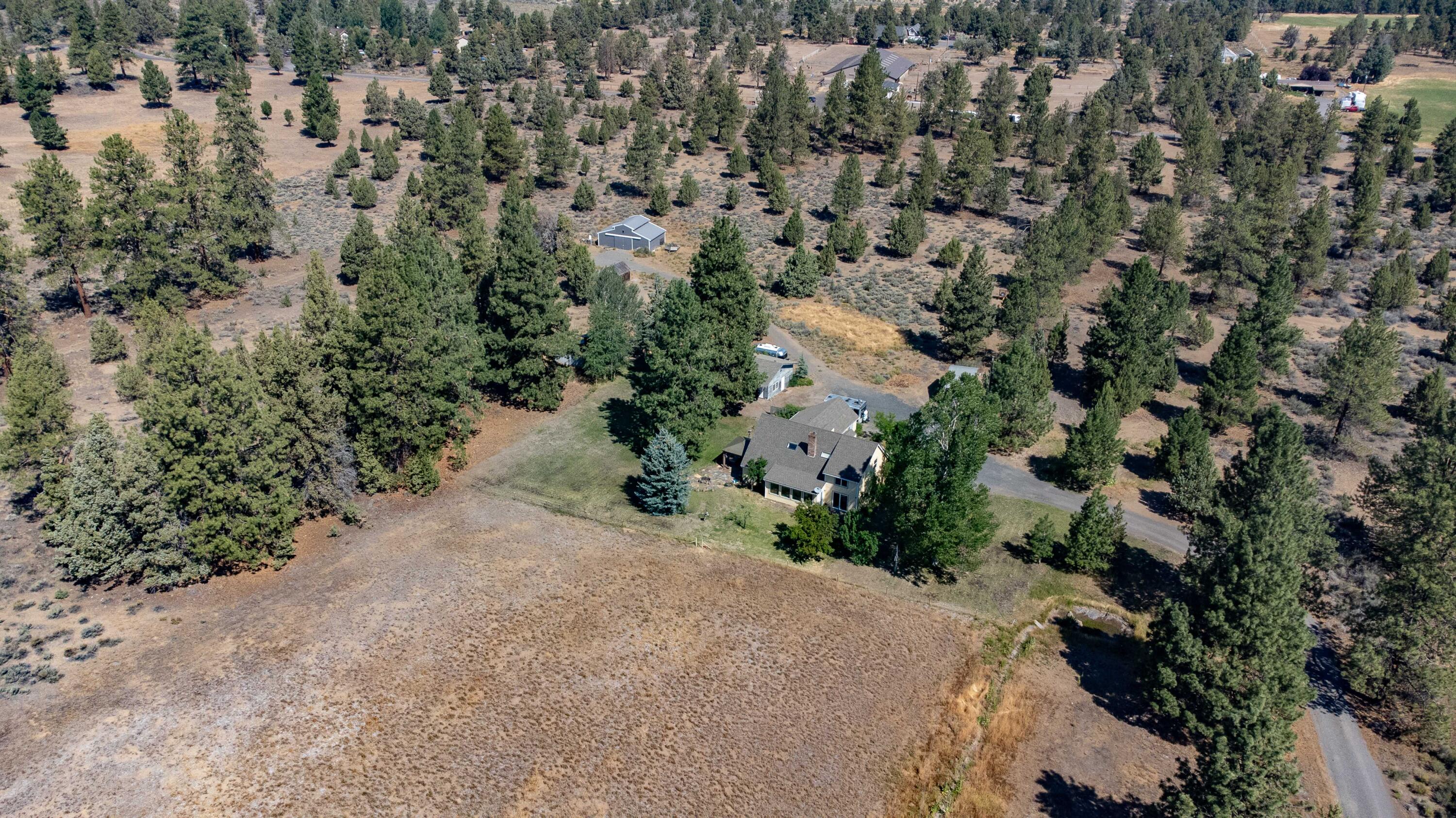 21698 Rickard Road Bend, OR 97702 - Photo 10 of 51 Nicely treed around the home and other buildings on the property.