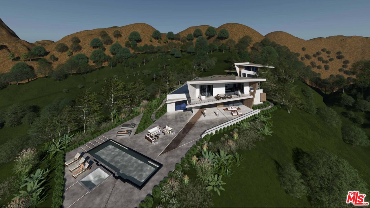 3030 Encinal Canyon Road Malibu, CA 90265 - Photo 12 of 12 an aerial view of a house with mountain view