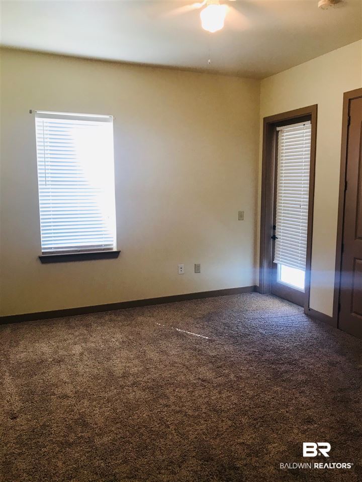 1430 Regency Road, Unit F304 Gulf Shores, AL 36542 - Photo 5 of 17 Master Bedroom