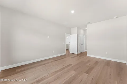 a bathroom with a double vanity sink and mirror
