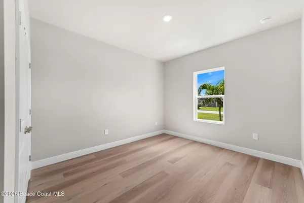 an empty room with window