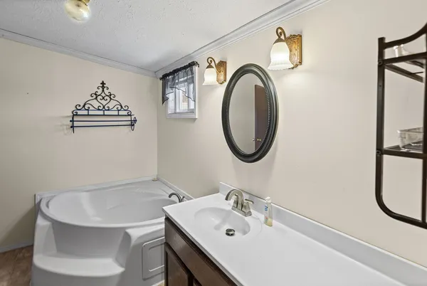 a bathroom with a toilet and shower curtain