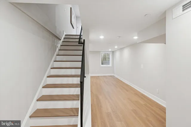 a view of entryway with wooden floor