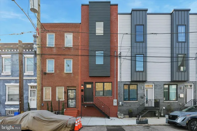 a car parked in front of a building