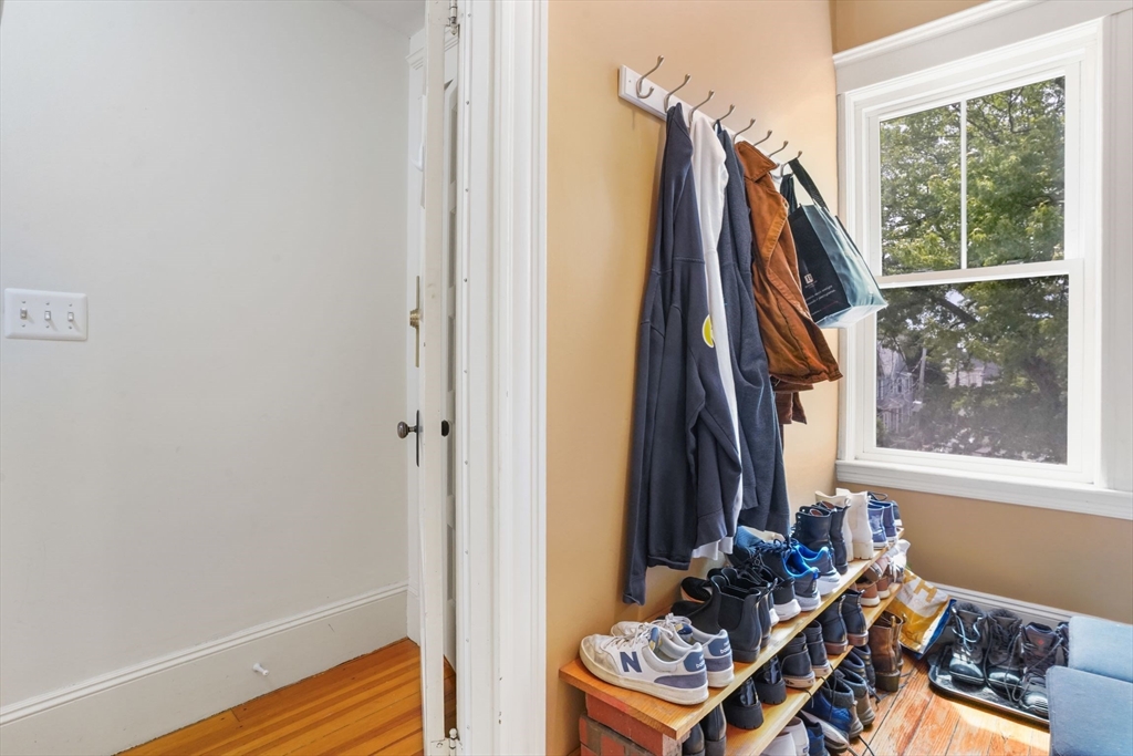 37 Dimick Street, Unit 3 Somerville, MA 02143 - Photo 10 of 12 a view of a front door and deck of the house