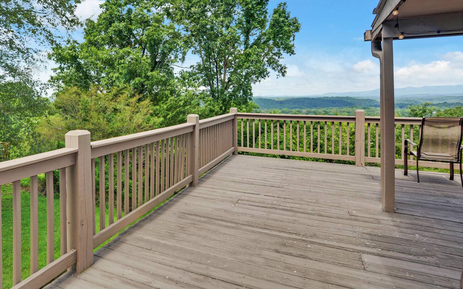 624 Talona Mountain Road Ellijay, GA 30536 - Photo 22 of 49 a view of a balcony with wooden floor