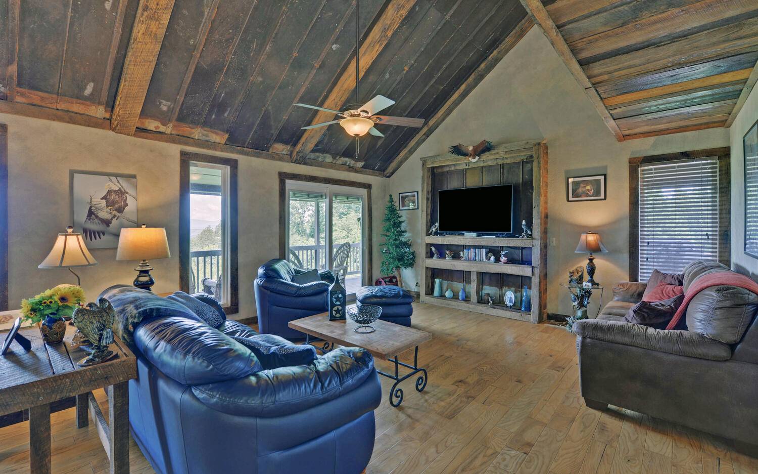 624 Talona Mountain Road Ellijay, GA 30536 - Photo 3 of 49 a living room with furniture and a flat screen tv