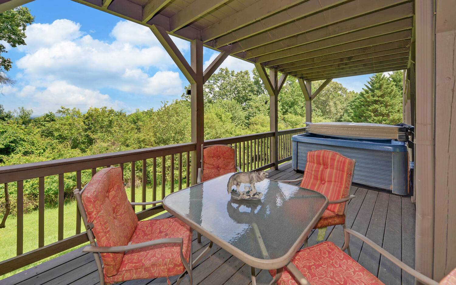 624 Talona Mountain Road Ellijay, GA 30536 - Photo 44 of 49 a view of a chair and table in the balcony