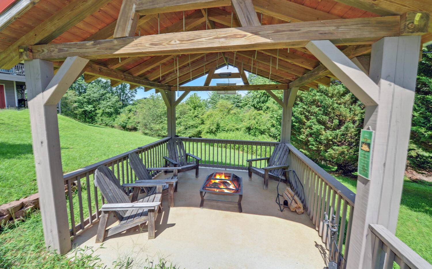 624 Talona Mountain Road Ellijay, GA 30536 - Photo 7 of 49 a view of a roof deck with chair and wooden floor