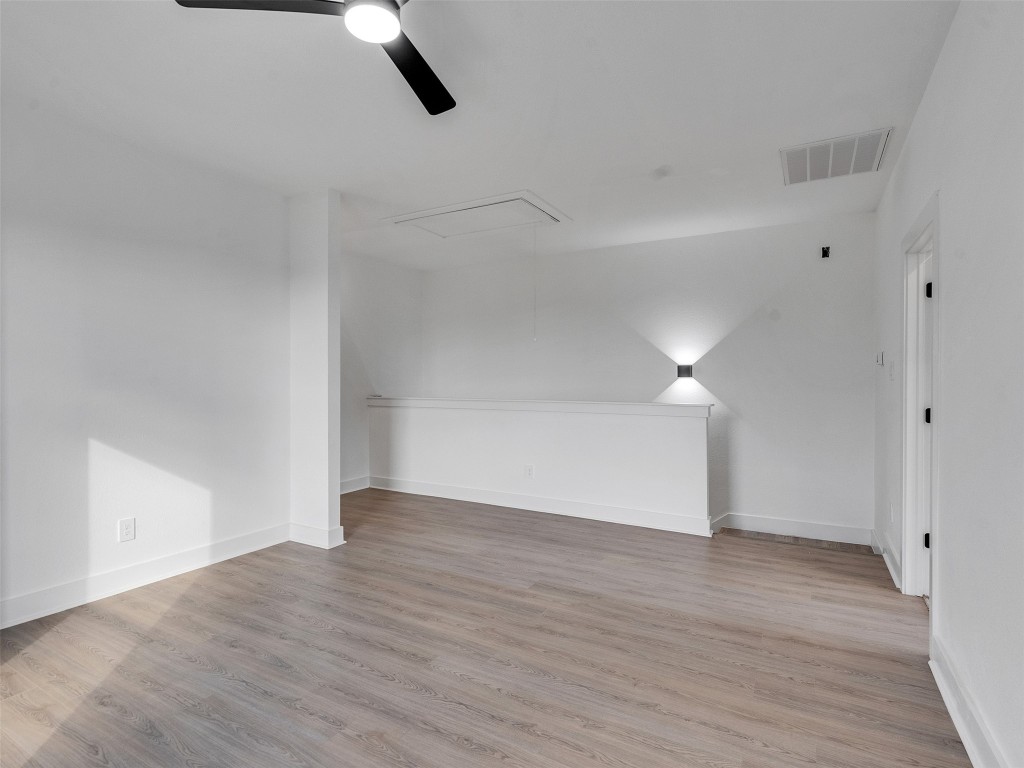 4421 Reed Road, Unit A AND B Houston, TX 77051 - Photo 13 of 27 a view of an empty room with wooden floor